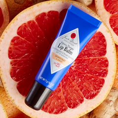 Bálsamo labial SPF25 de Jack Black, textura cremosa para labios secos.