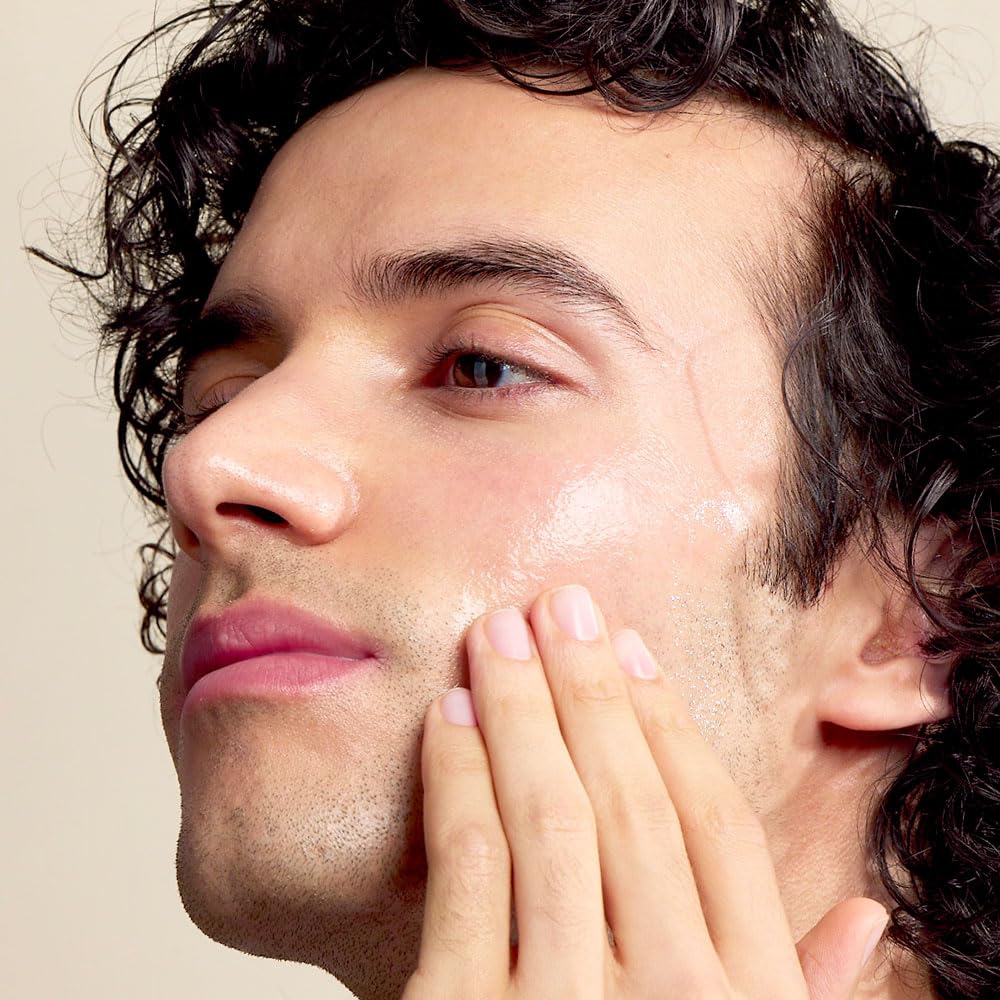 Jack Black Epic Moisture Ultimate Oil on hair to add shine and reduce frizz