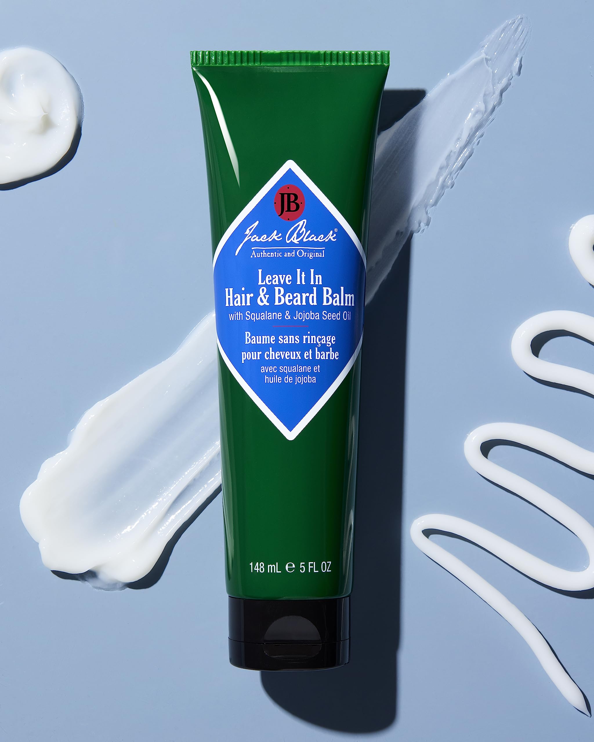Jack Black Leave It In Hair & Beard Balm dispenser close-up showing quick absorption.