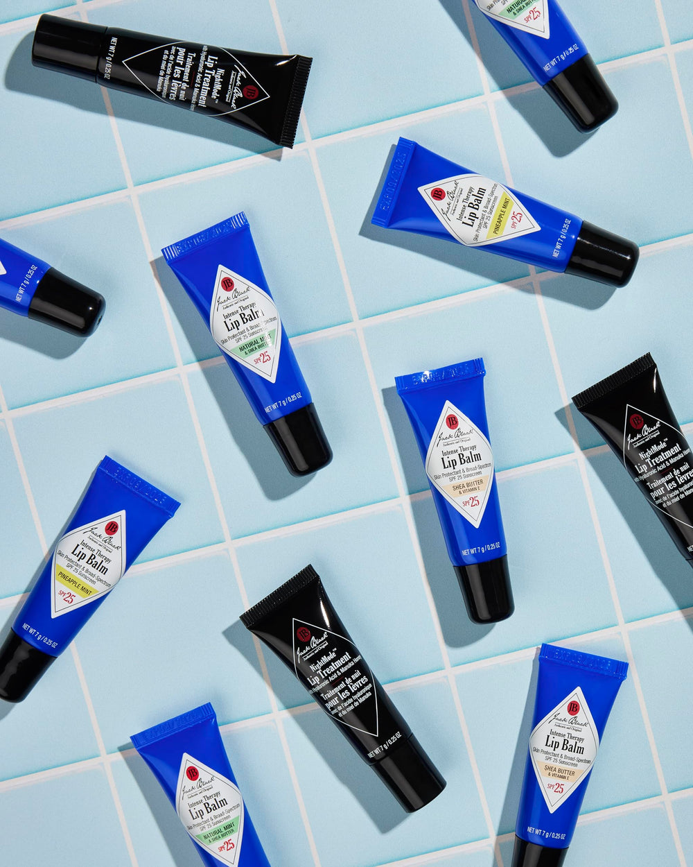 Jack Black balm sits on a desk for quick lip care