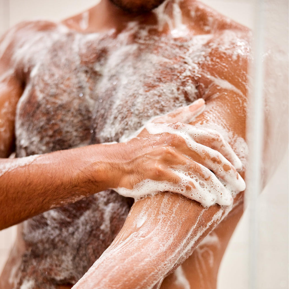 Creamy foam in shower for hair and body cleansing.
