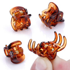 JANYUN mini clip closeup showing secure grip and sturdy plastic-metal construction