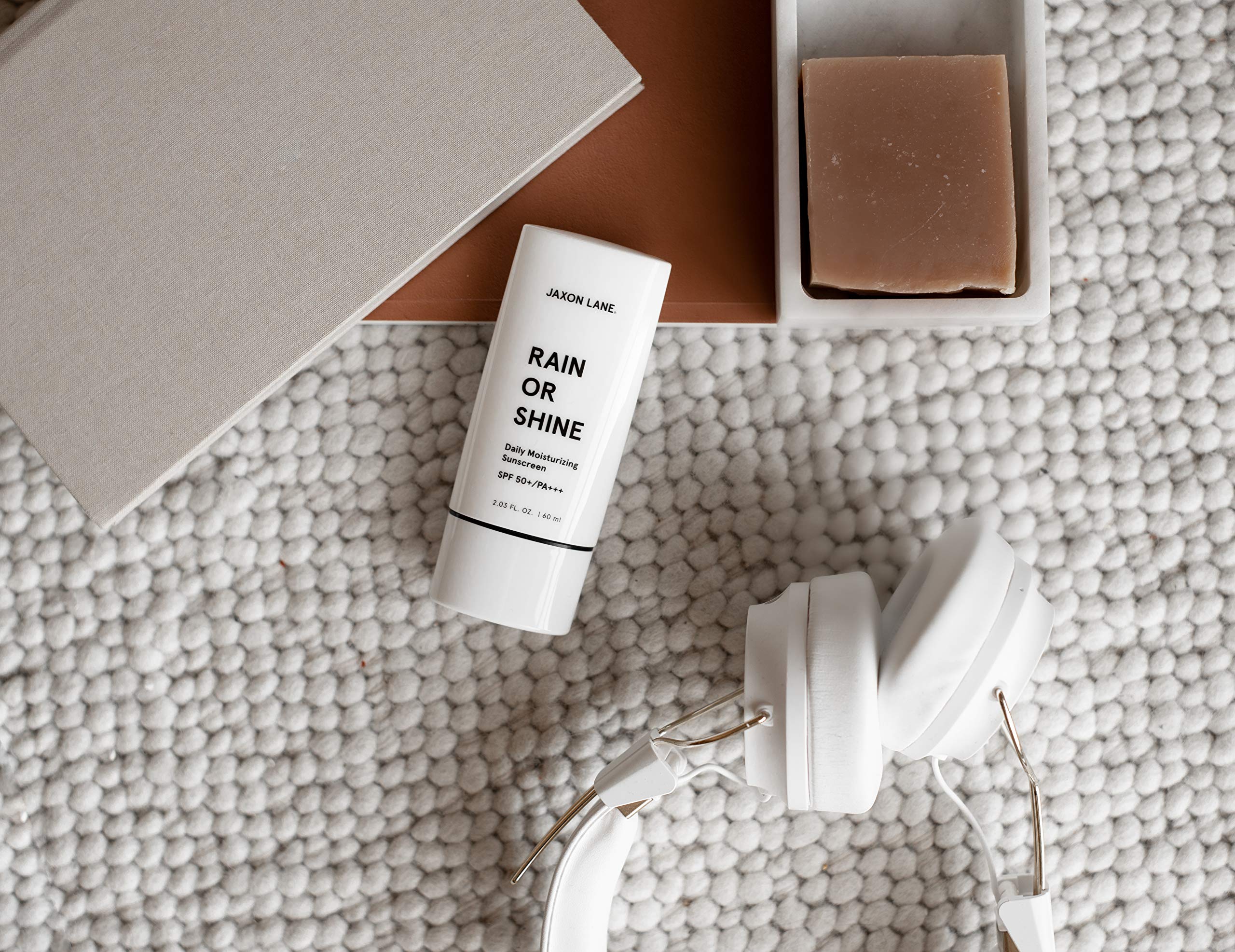 JAXON LANE Fragrance-free sunscreen texture viewed for non-irritating daily use.