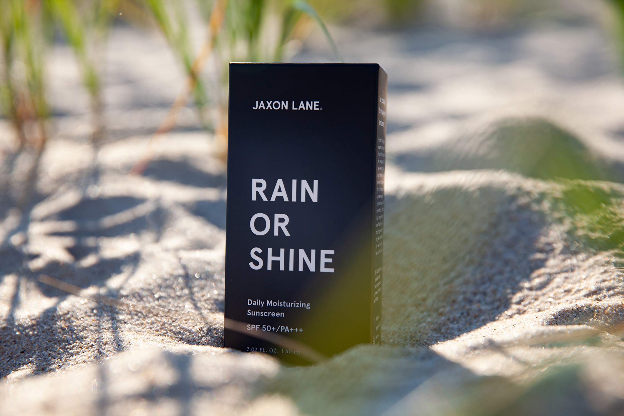 JAXON LANE Non-greasy finish demonstrates fast-absorbing facial sunscreen.