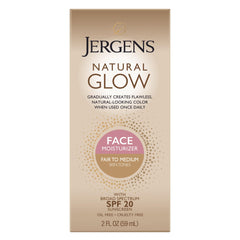 Jergens Natural Glow crema facial frente, tono suave para piel clara.