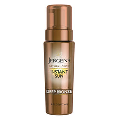 Jergens Natural Glow Mousse: botella visible, color instantáneo para un bronceado natural.