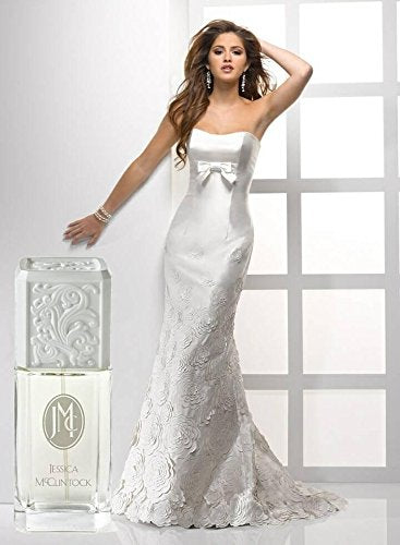 Jessica McClintock Eau De Parfume bottle side view highlighting citrus notes for freshness.