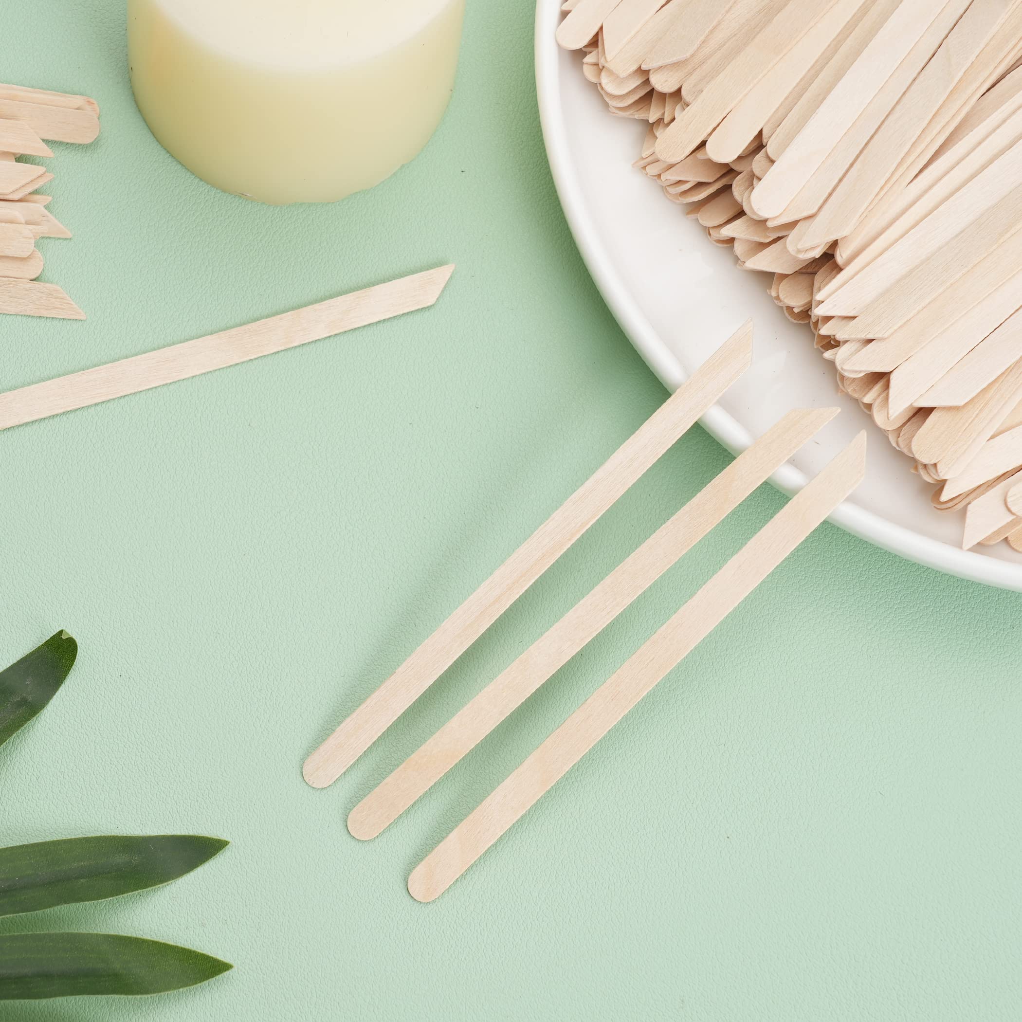JIUHSHN wax sticks showing dual-tip design for versatile waxing tasks.