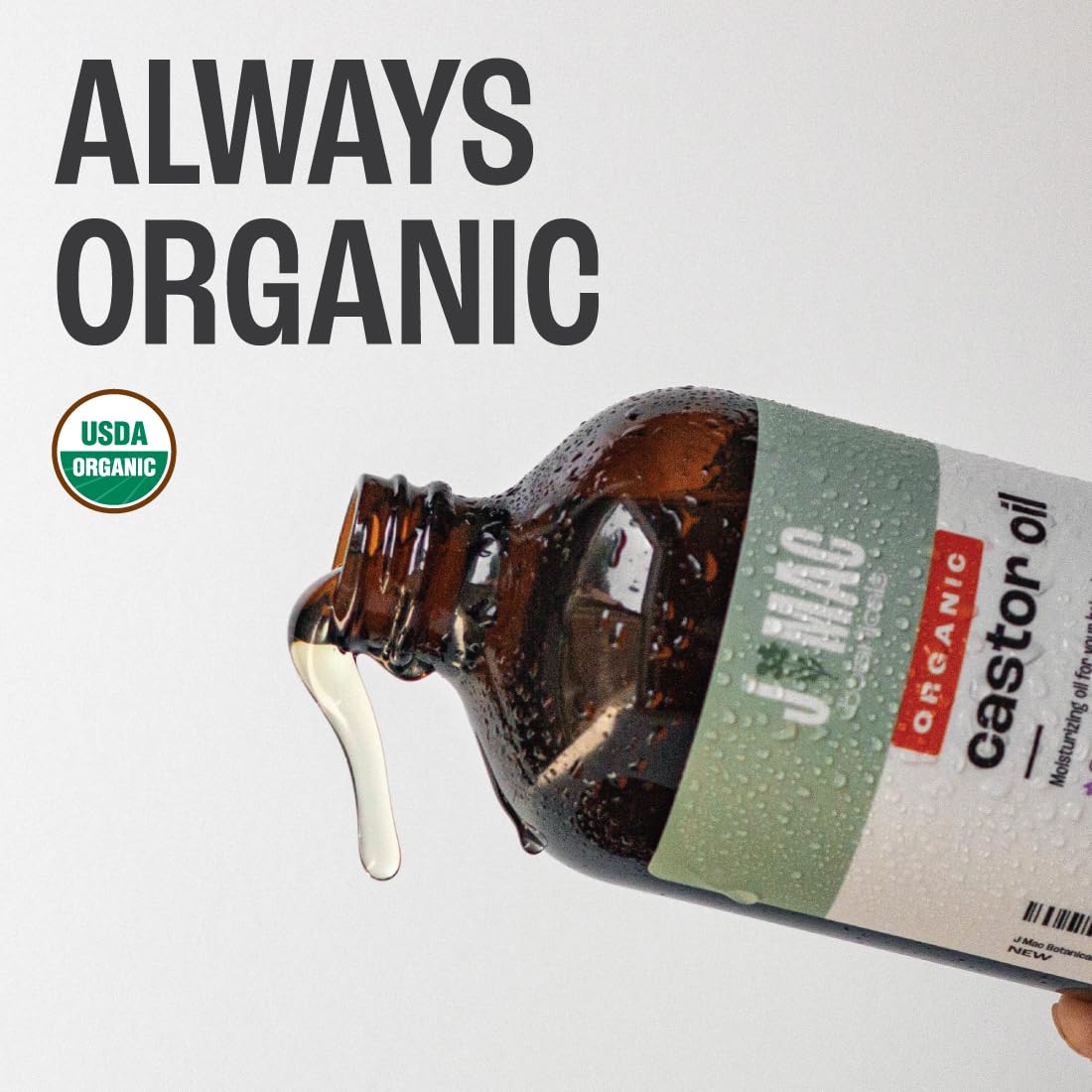 J Mac Botanicals castor oil bottle pour for easy skin application.