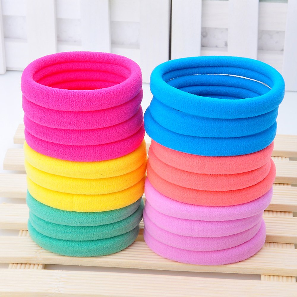 J-MEE seamless hair bands in use with packaging for daily styling.