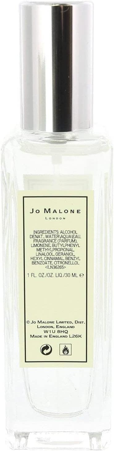 Cap detail of Jo Malone English Pear & Freesia bottle, elegant packaging