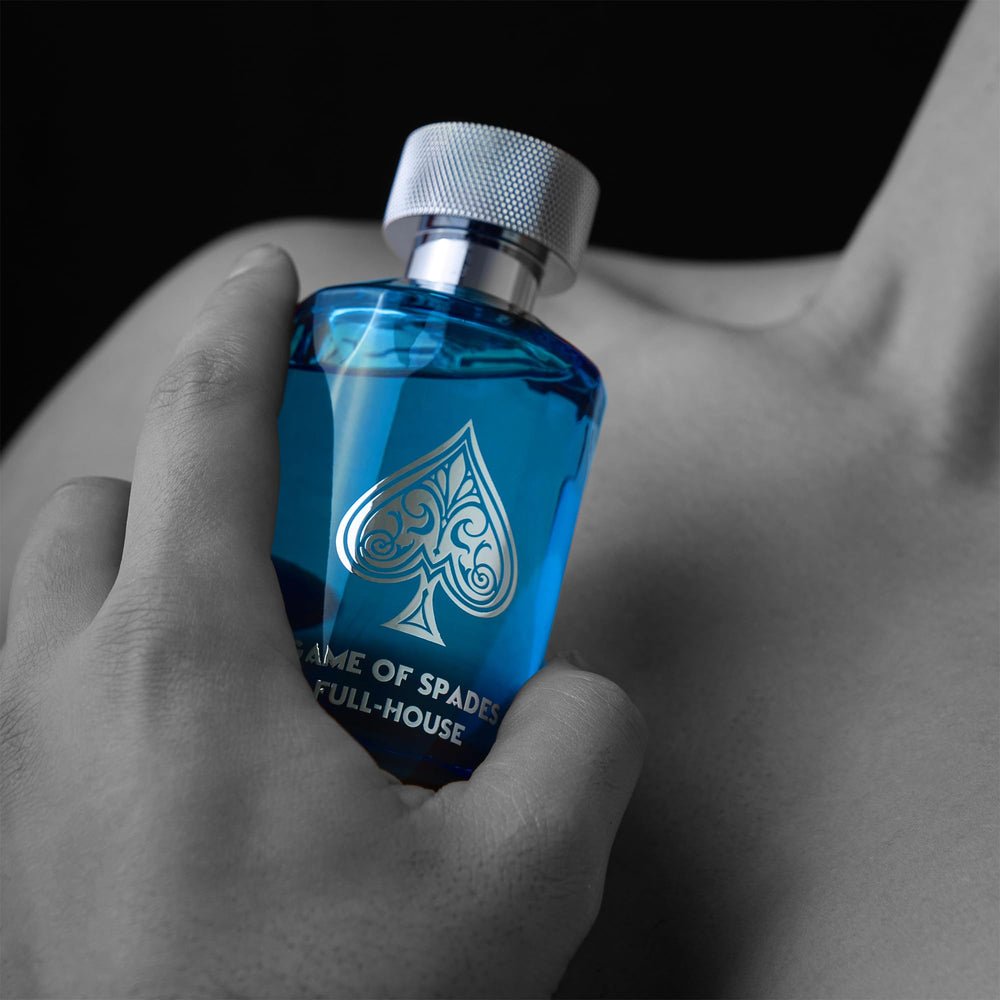 Jo Milano Game of Spades Full House display setup, versatile unisex fragrance showcased.