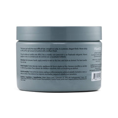Johnny B. Dope Texture Gel bottle cap close-up highlights grip during styling.