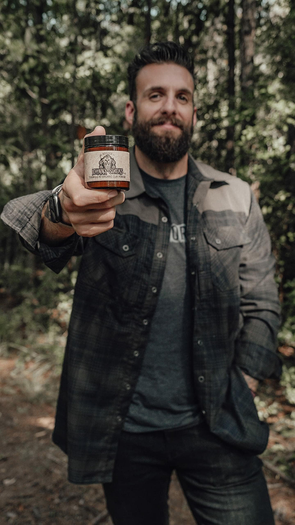 Apply Johnny Slicks Formula 49 clay to dry hair for versatile styling.