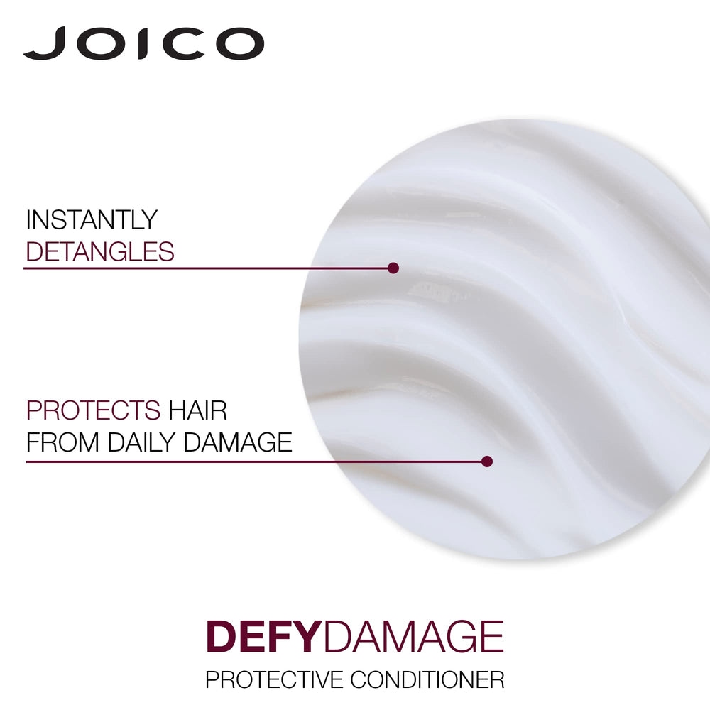 Joico Defy Damage bottle pouring a stream of shampoo.