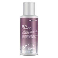 Botella de Joico Defy Damage Condicionador destaca hidratación suave para uso diario.