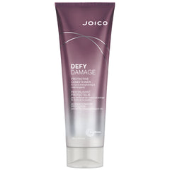 Joico Defy Damage Protective Conditioner bottle showing creamy formula for color protection and detangling