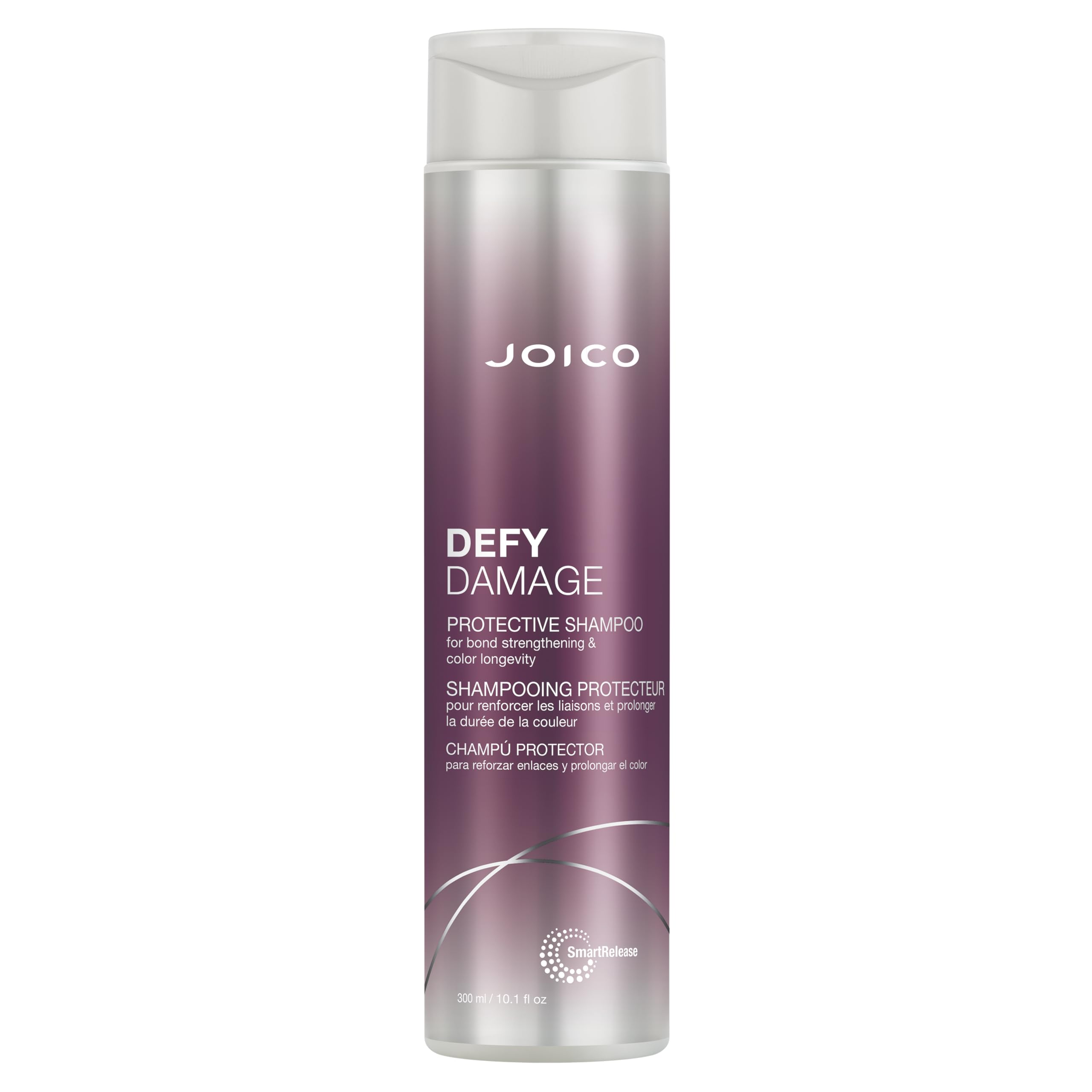 Joico Defy Damage Shampoo bottle being poured for color-safe cleansing