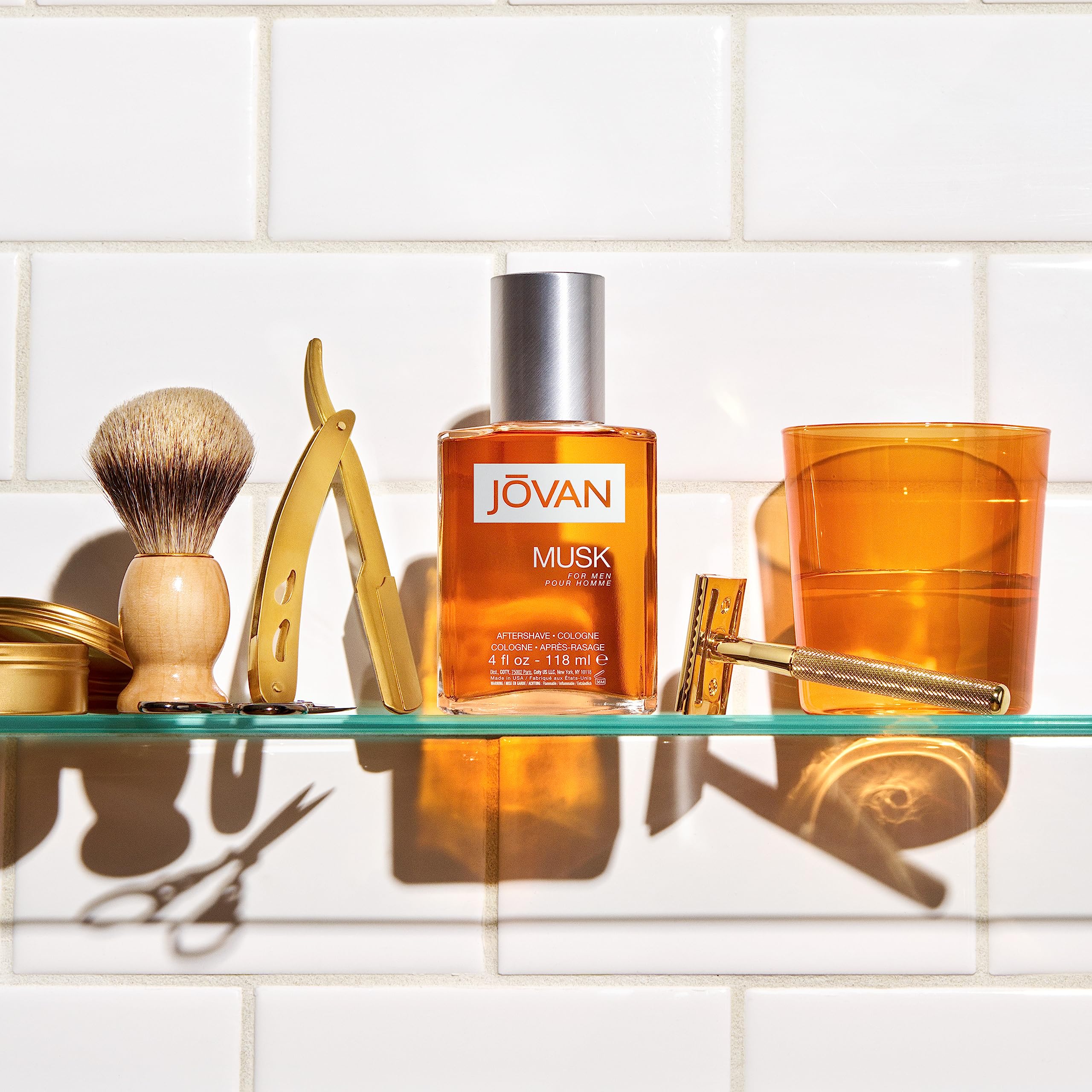 Jovan Musk for Men aftershave label closeup with premium branding and amber hues