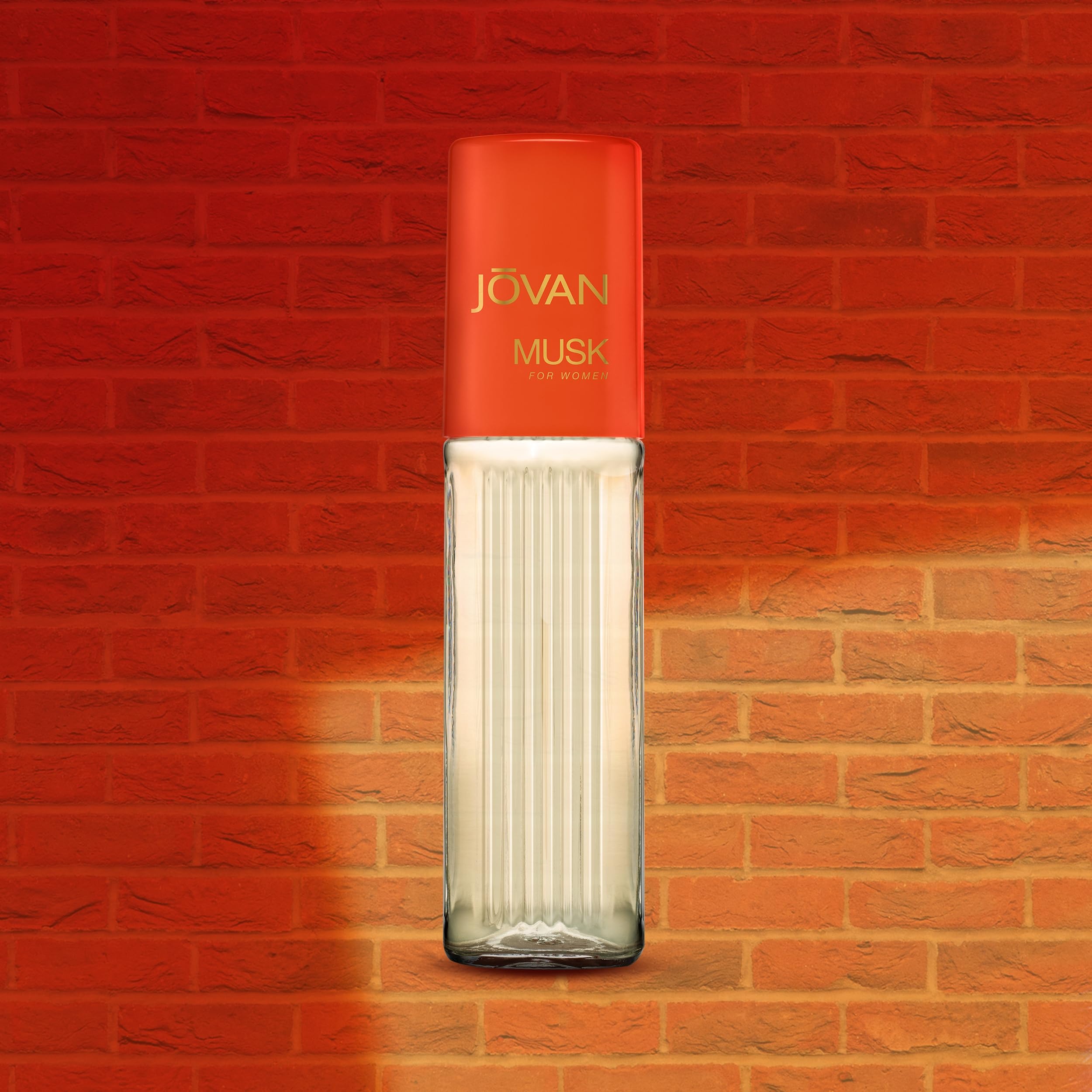 Jovan Musk cap closeup emphasizes premium packaging and easy handling.