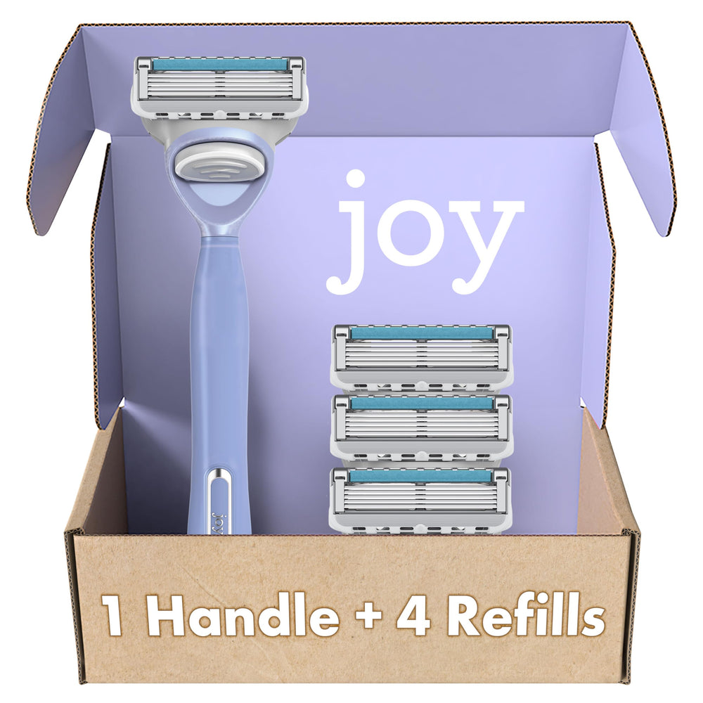 JOY teal razor handle close-up with ergonomic grip for comfortable shaving.