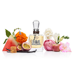 Close-up of Juicy Couture perfume cap showing playful, confident branding.