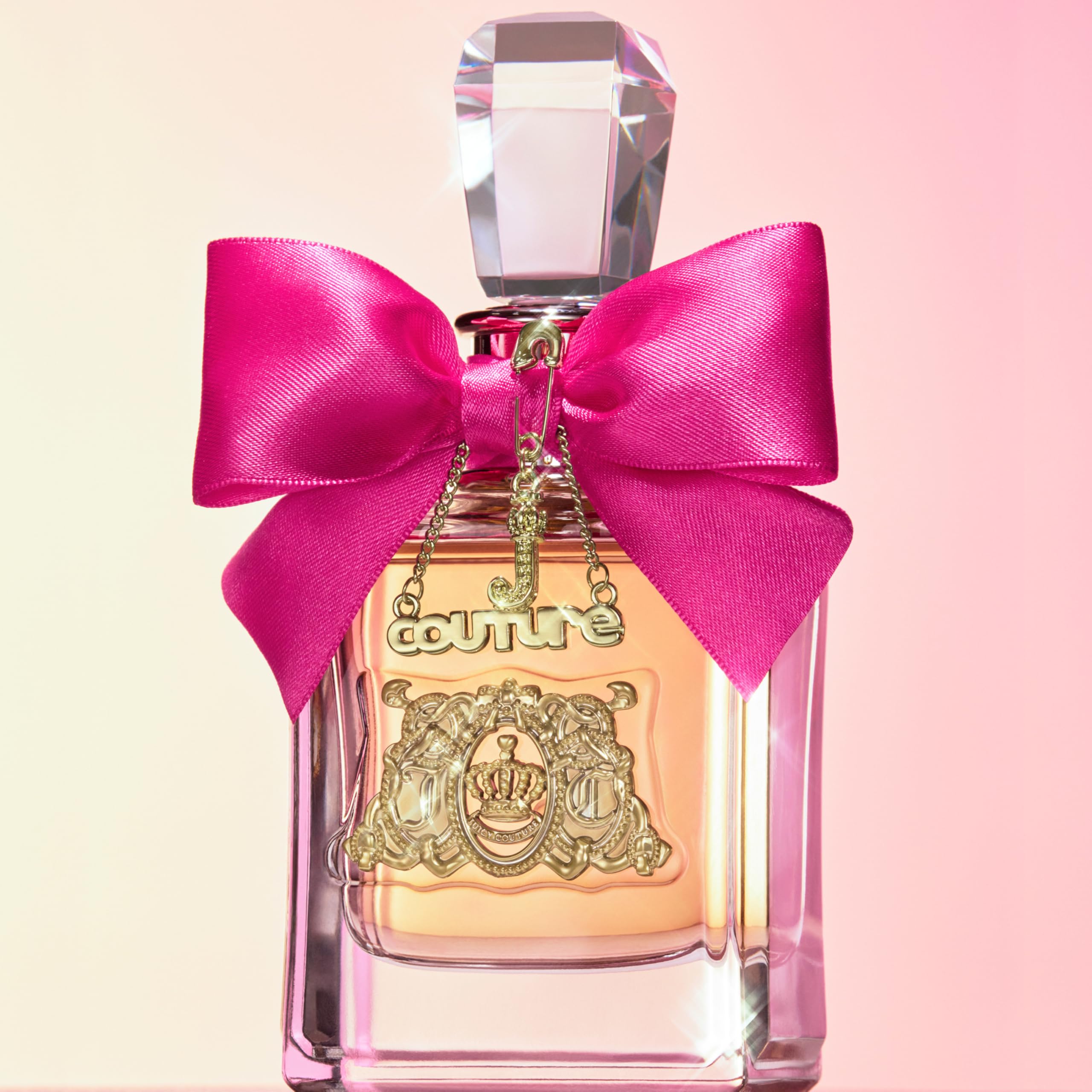 Juicy Couture Viva La Juicy scene with floral accents, spring vibe.