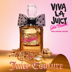 Juicy Couture Viva La Juicy Gold bottle with pink bow cap communicates playful elegance.