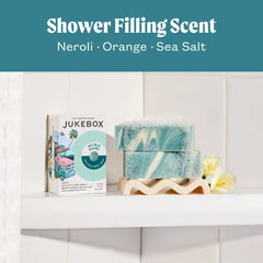 Close-up of JUKEBOX soap bar showing creamy lather and natural ingredients