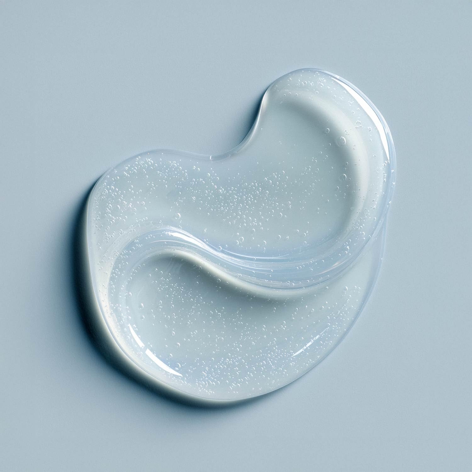 Just Nutritive Gray Hair Shampoo being poured to reduce yellowing buildup.