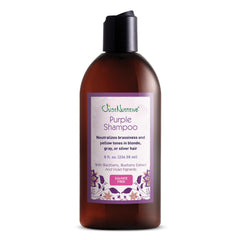 Just Nutritive Purple Shampoo bottle pours to neutralize brassiness for cooler tones.