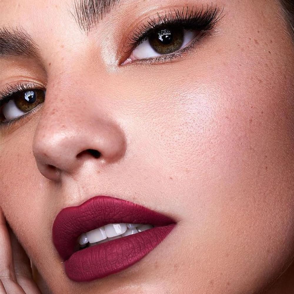 Kaely wine-red lipstick with matte velvet finish for long-lasting color.