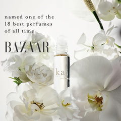 Kai perfume oil gardenia bottle closeup showcasing vegan, clean formula.