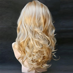 Kalyss Blonde Wig with Bangs, side view, voluminous waves for events.