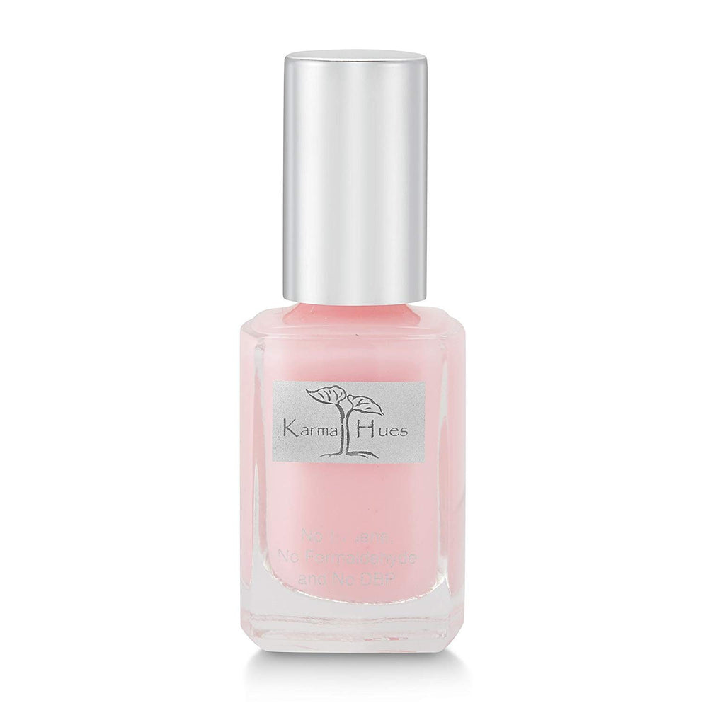 karma orgánico esmalte de uñas en botella con acabado seguro y libre de toxinas.