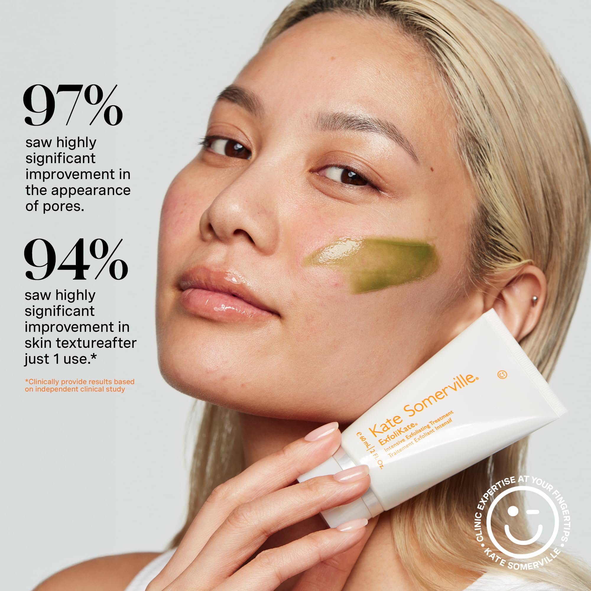 Applying Kate Somerville Exfolikate Intensive to damp skin during a quick ritual.