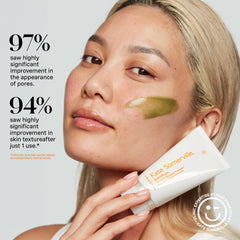 Applying Kate Somerville Exfolikate Intensive to damp skin during a quick ritual.