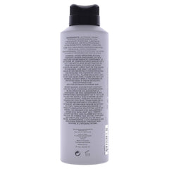 Kenneth Cole Reaction bottle cap closeup showing premium design and spray capability.
