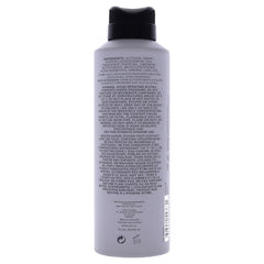 Kenneth Cole Reaction mist in motion suggesting long-lasting energizing scent.