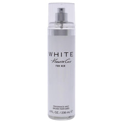 Kenneth Cole White For Her bottle pour, a fresh feminine scent with long-lasting allure.