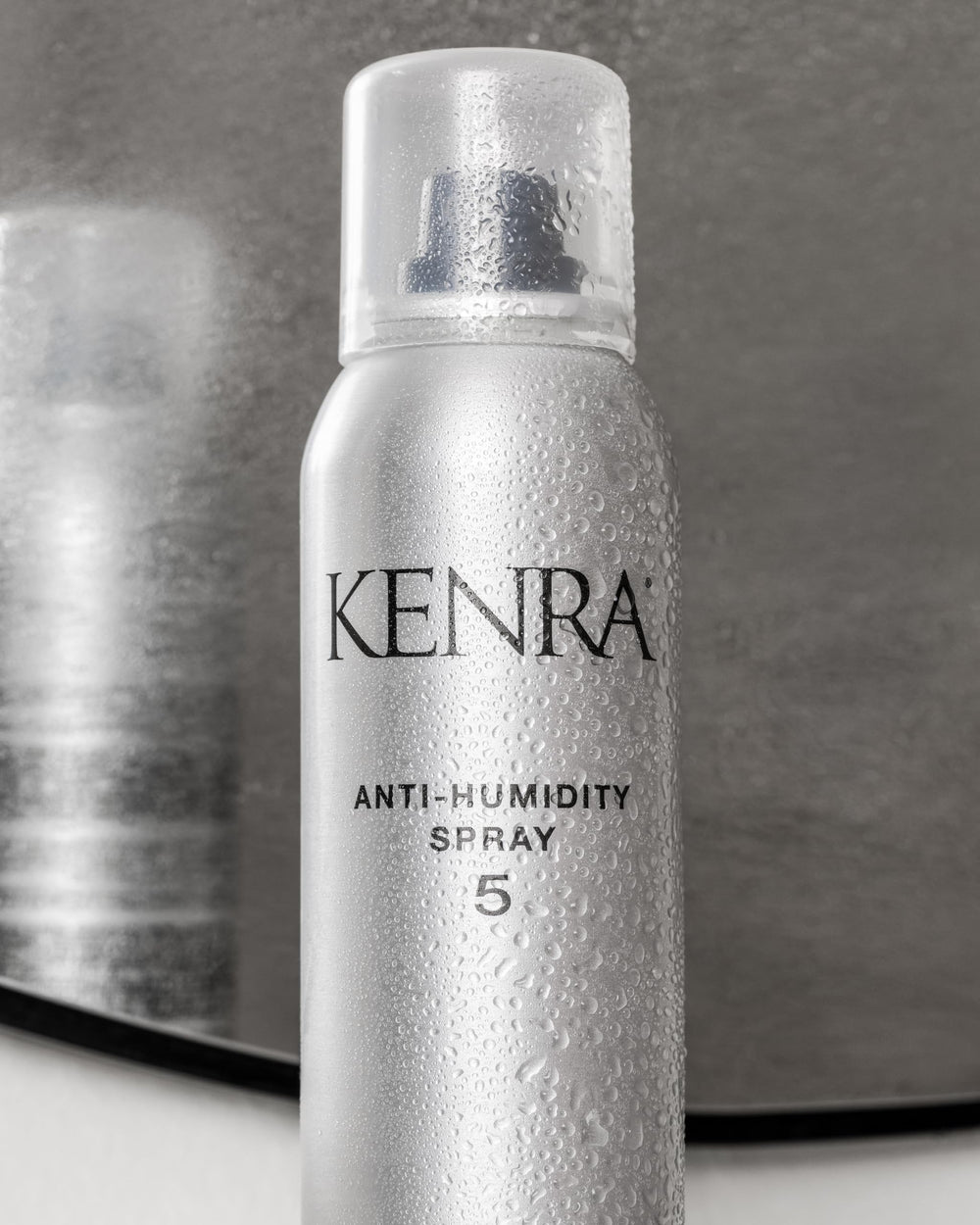 Kenra Anti-Humidity Spray 5 72-hour humidity resistance on styled hair.