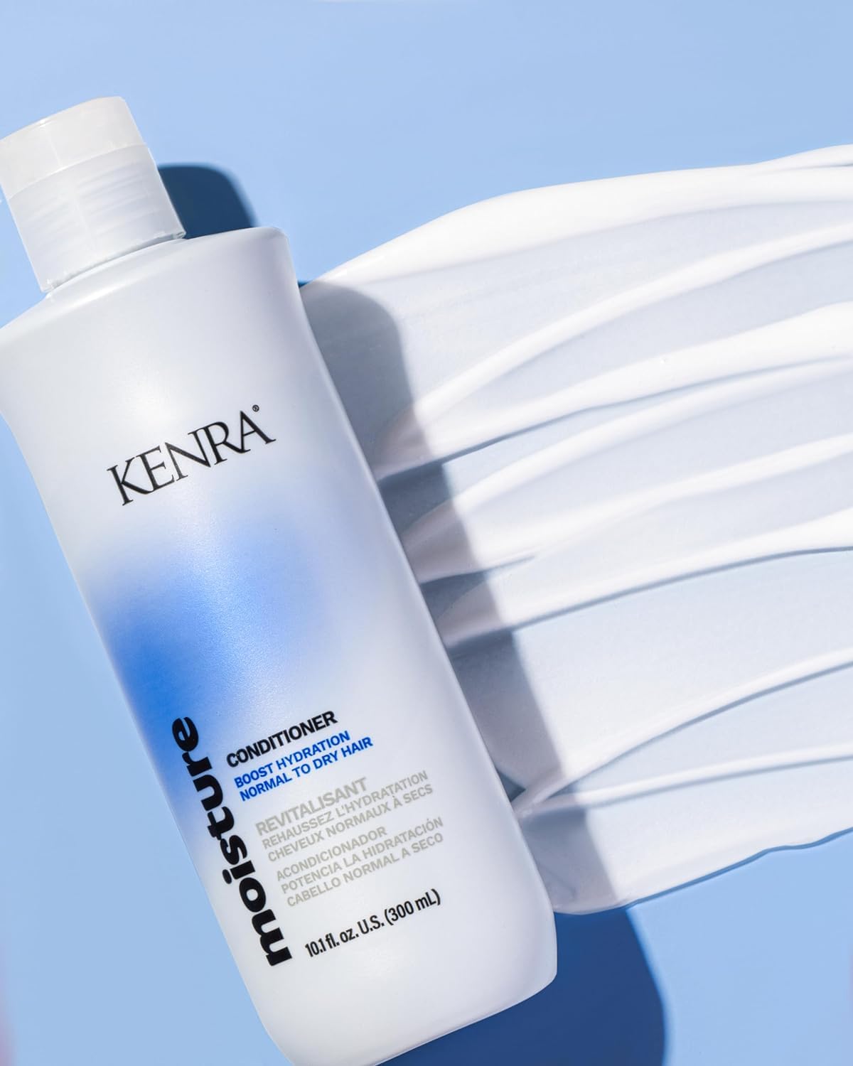 Kenra Moisture Conditioner bottle front emphasizes softness and manageability.