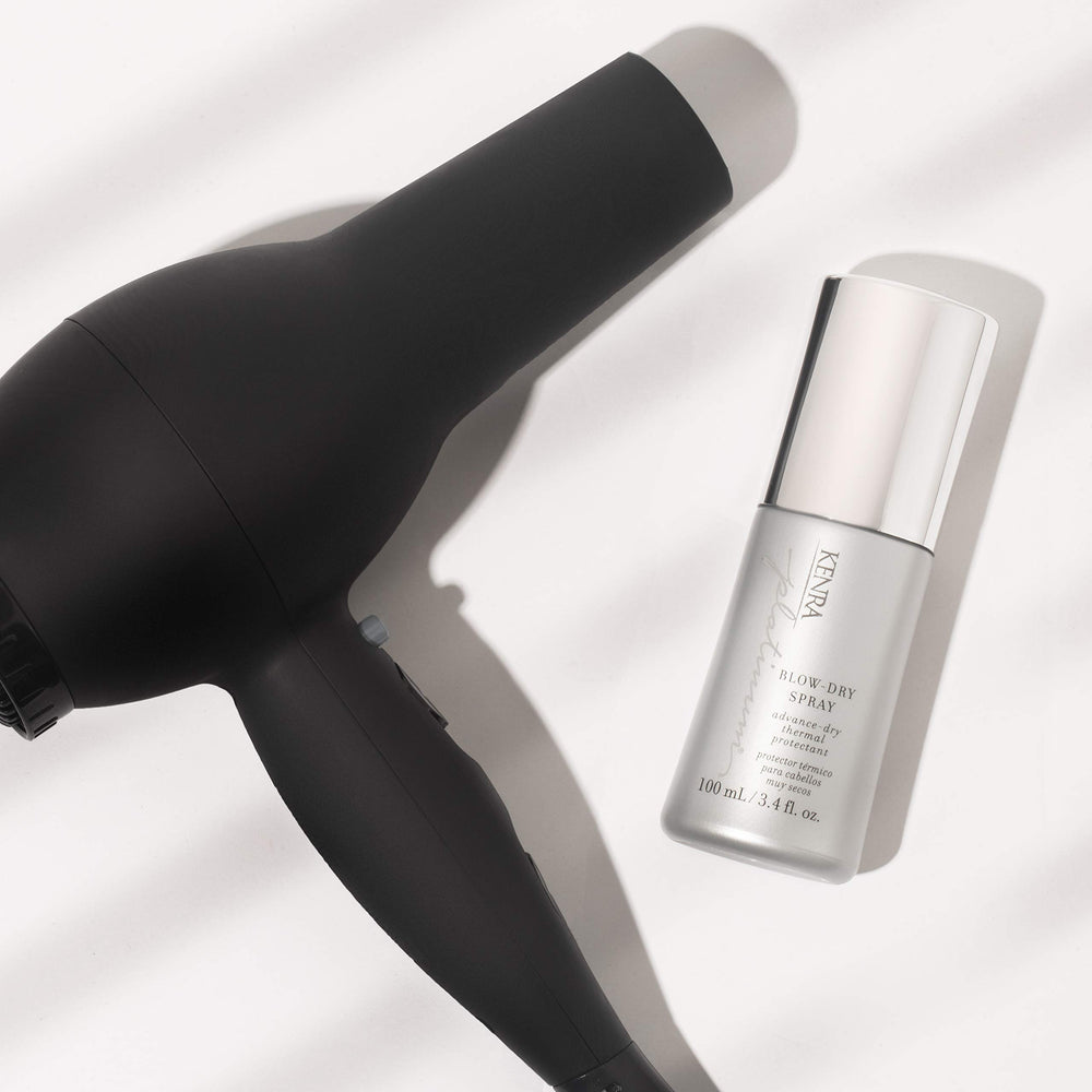 Kenra Platinum Blow-Dry Spray detangles for easier combing and styling.