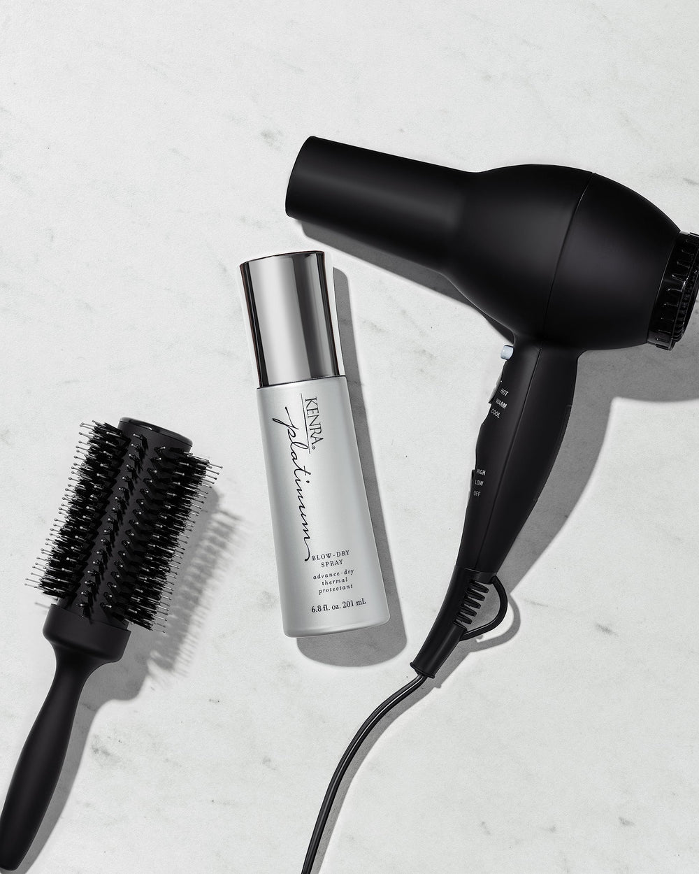 Kenra Platinum Blow-Dry Spray demonstrating frizz elimination and humidity resistance