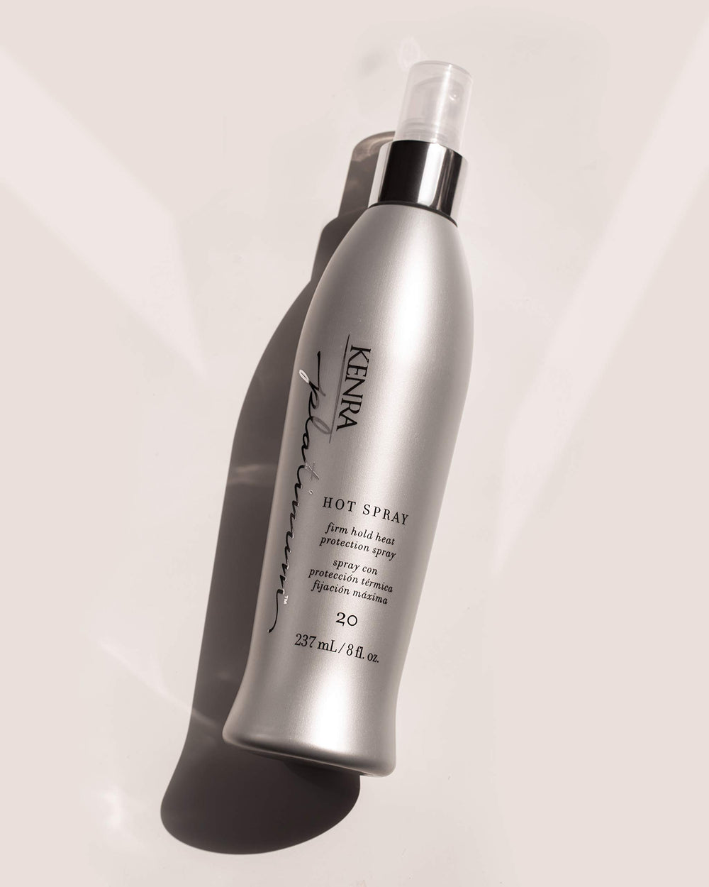 Kenra Platinum Hot Spray 20 adds vibrant shine for a polished finish