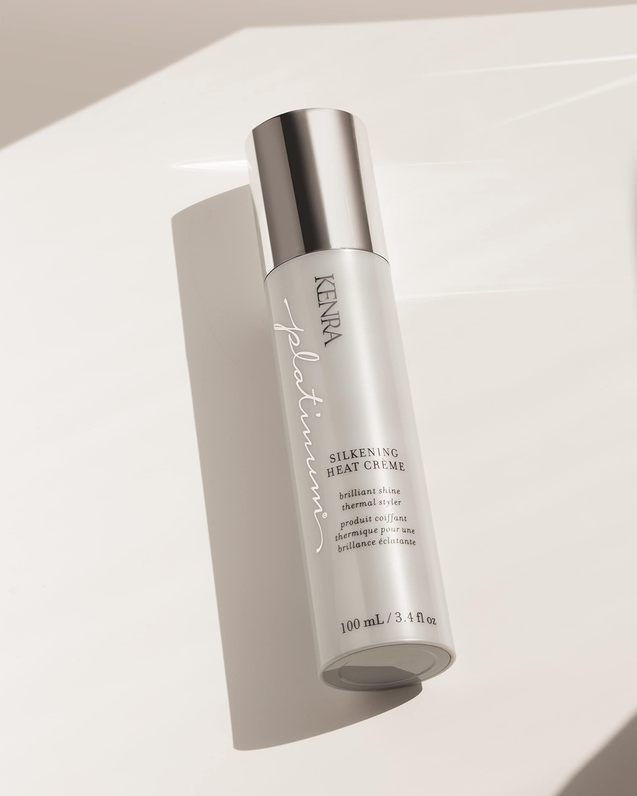 Styling with Kenra Platinum Silkening Heat Crème for sleek, manageable hair