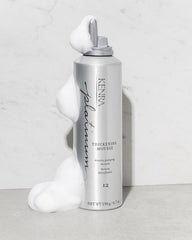 Kenra Platinum Thickening Mousse 12 texture close-up highlights lightweight foam for density.