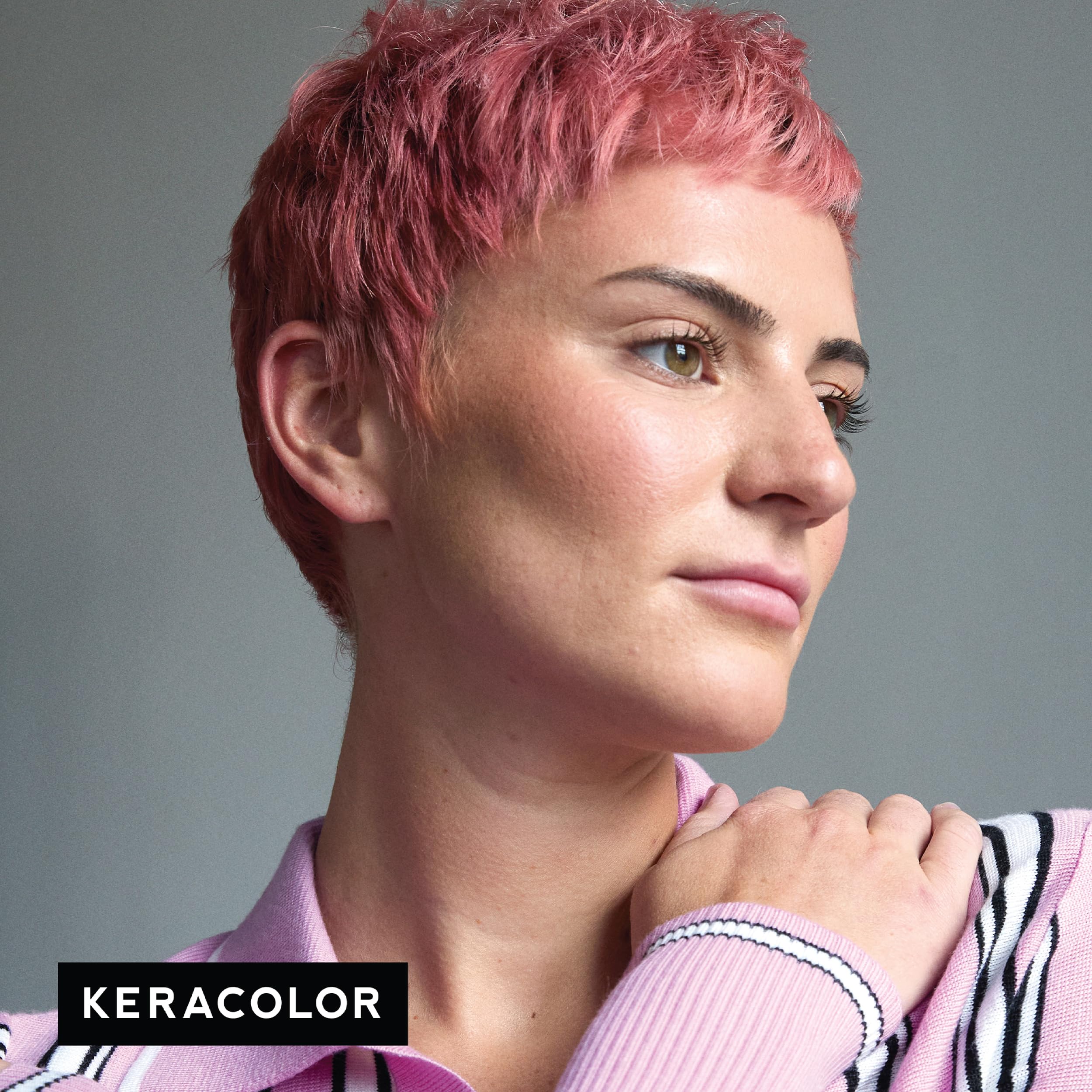 Hair sectioning during Keracolor Rose Gold Clenditioner application for even color.