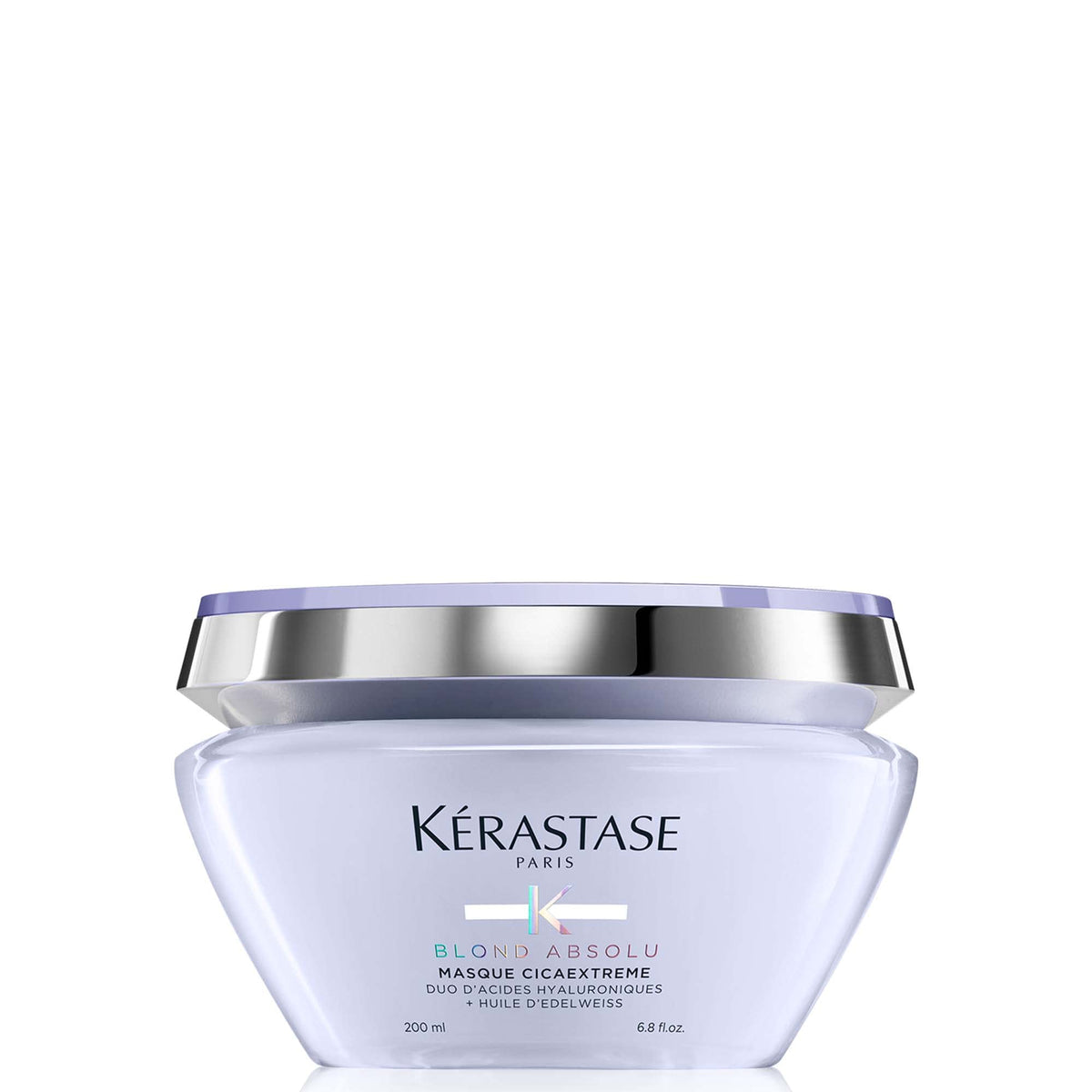 Kerastase Blond Absolu Cicaextreme mask application on damp hair for deep nourishment.