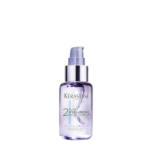 Dispensing action of Kerastase serum showing the lightweight formula soothing the scalp.